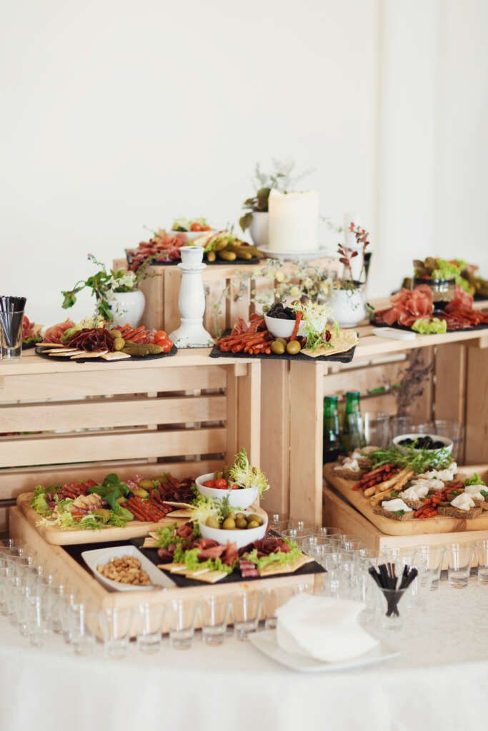 wooden boxes with wine salty snacks